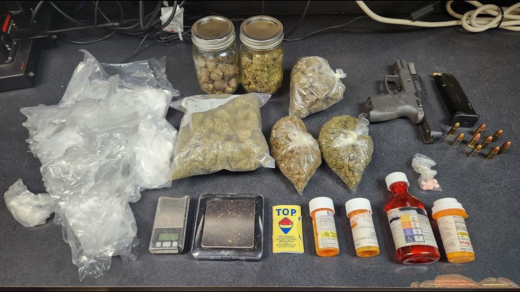 Traffic stop for window tint leads to firearms and drugs