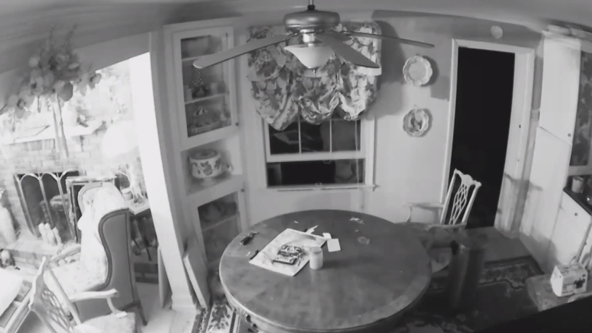 Surveillance shows suspect entering home and stealing items