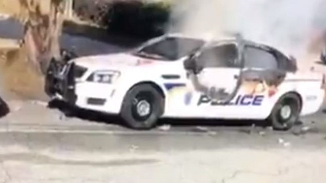 Four officers injured patrol cars burned during Columbia protests