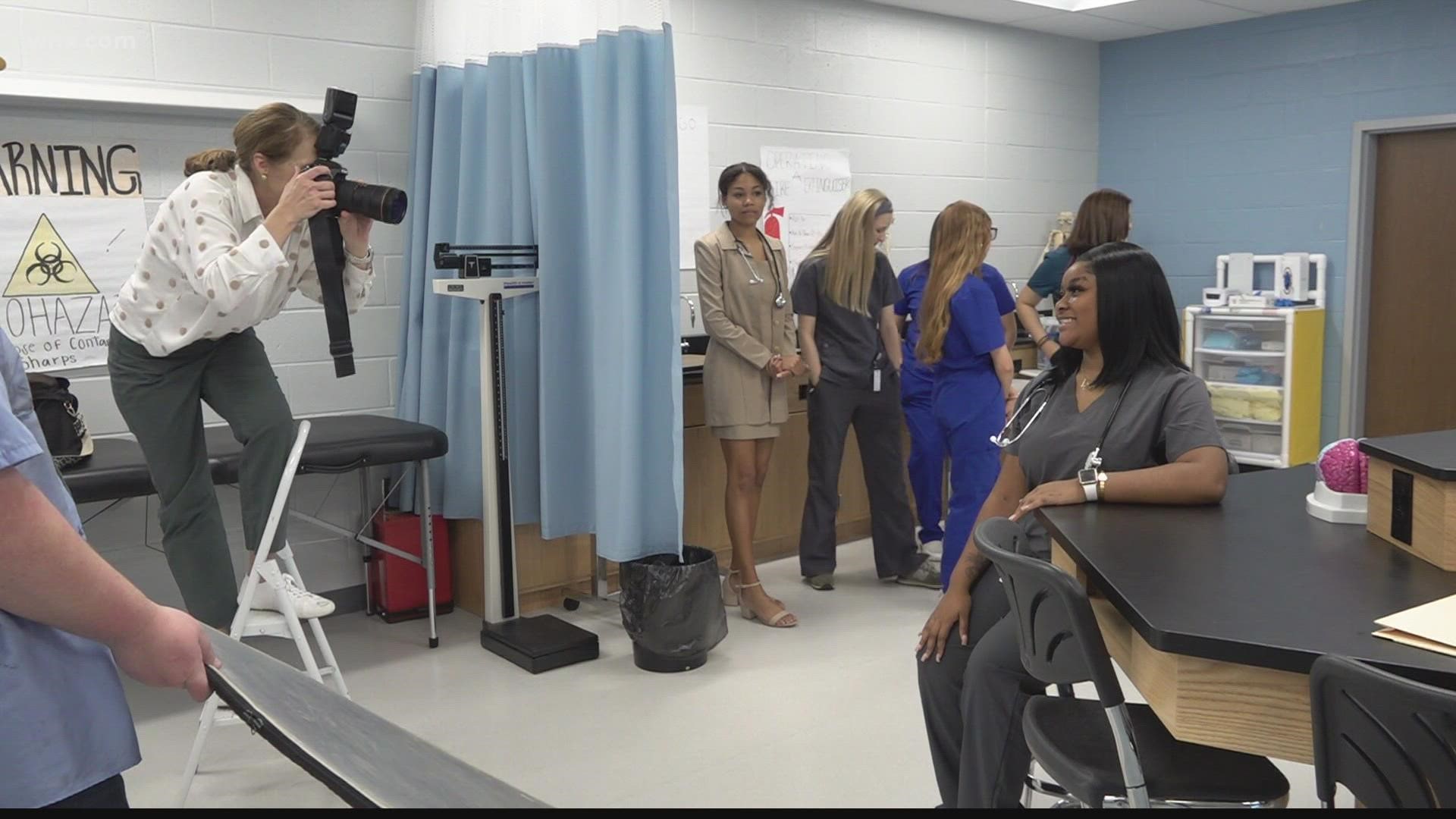 Woolard Technology Center in Camden is helping its senior students get a head start on real life by providing them senior career photos.