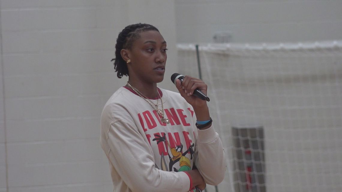 Ashlyn Watkins makes appearance at Alex English basketball camp