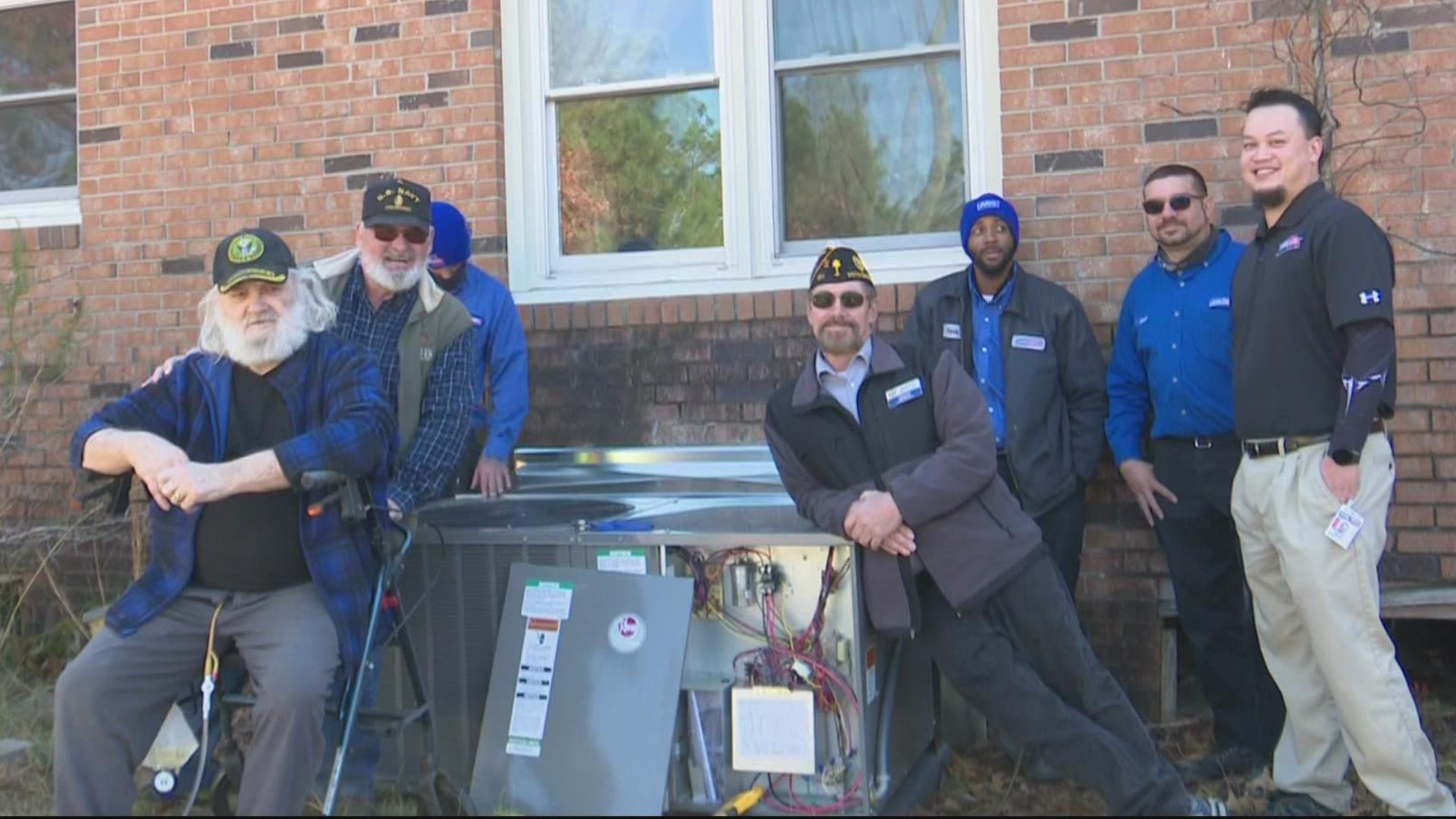 The community came together to surprise veteran Charles Heck with a new heating and air conditioning unit for his home.