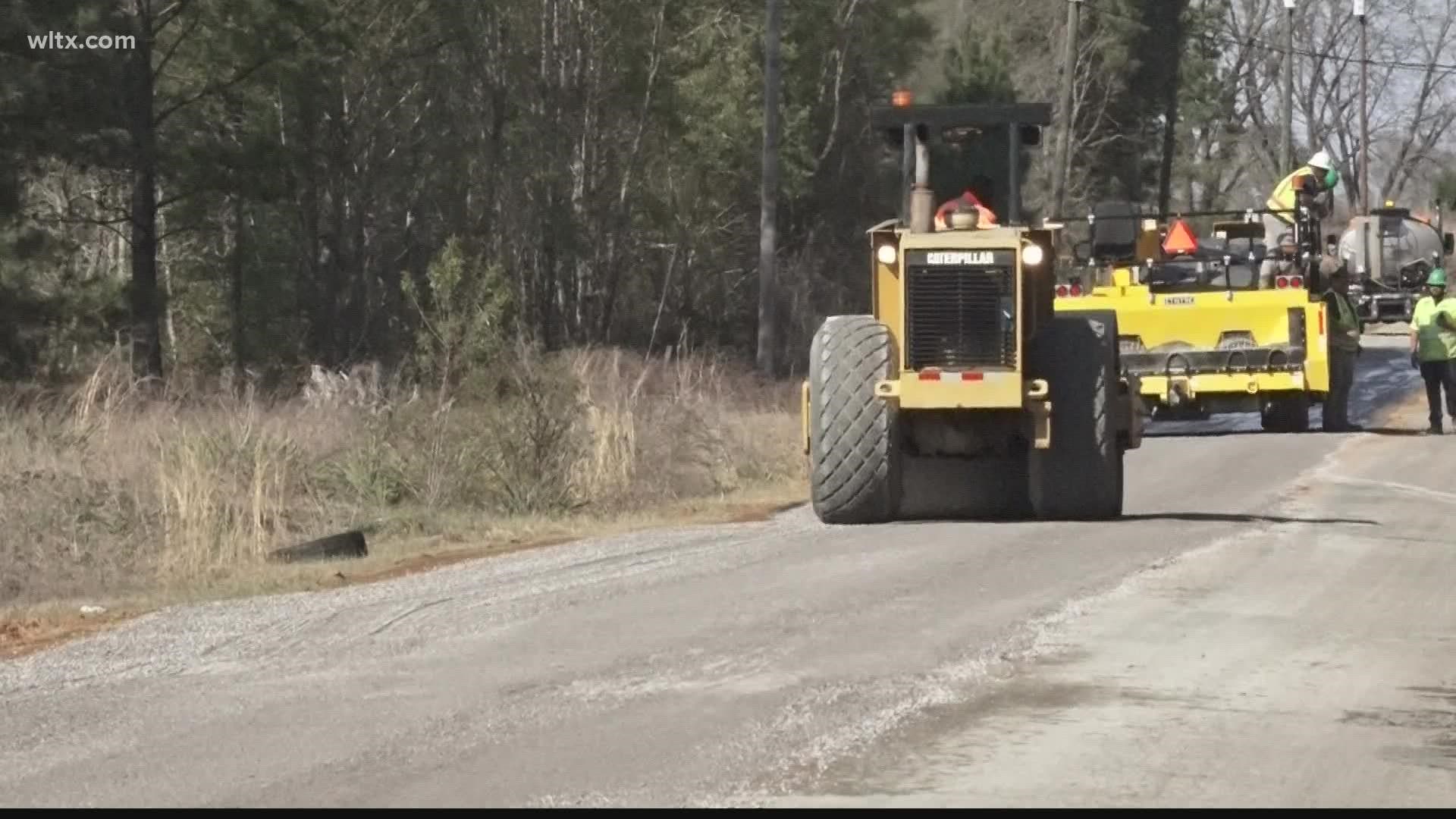 Residents along Blackville Road in Gaston have been hearing cars bumping over potholes along their street for almost 30 years.