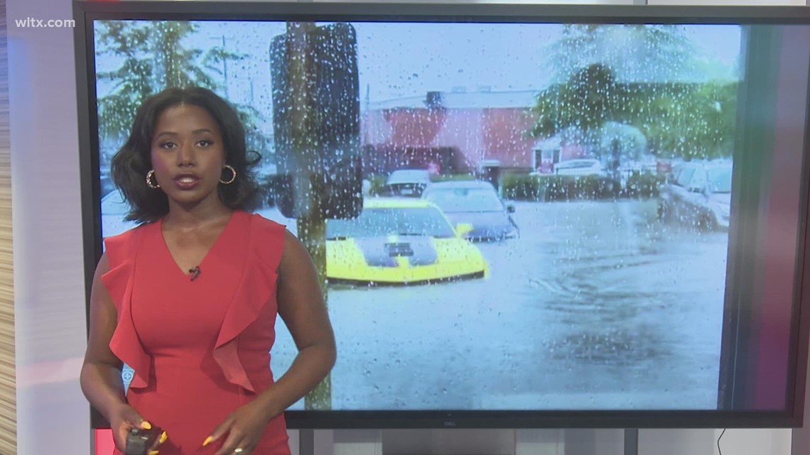 Two inches of rain in hour flood streets but roads beginning to clear