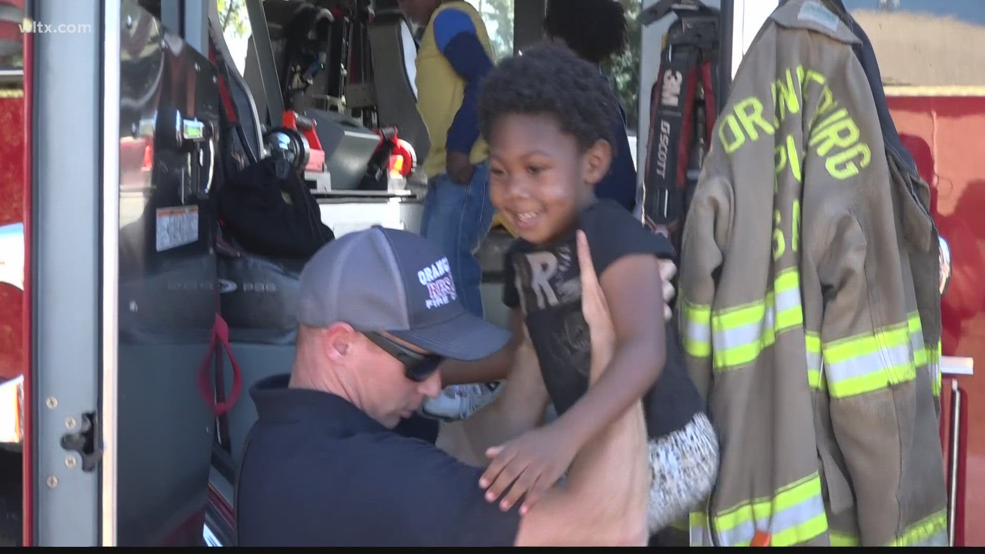 Firefighters taught children how to be safe and what to do if there is a fire.