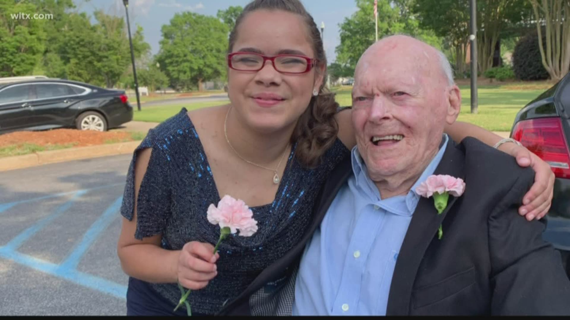 A 107-year-old World War II veteran attended Chapin High School's ROTC ball after being invited by a student.