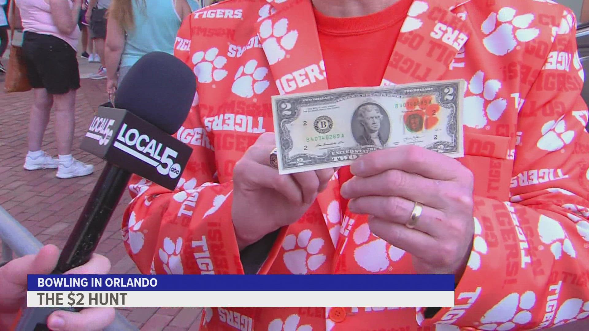 Local 5's Colin Cahill finds out why Clemson fans are carrying around $2 bills ahead of Wednesday's matchup against Iowa State.