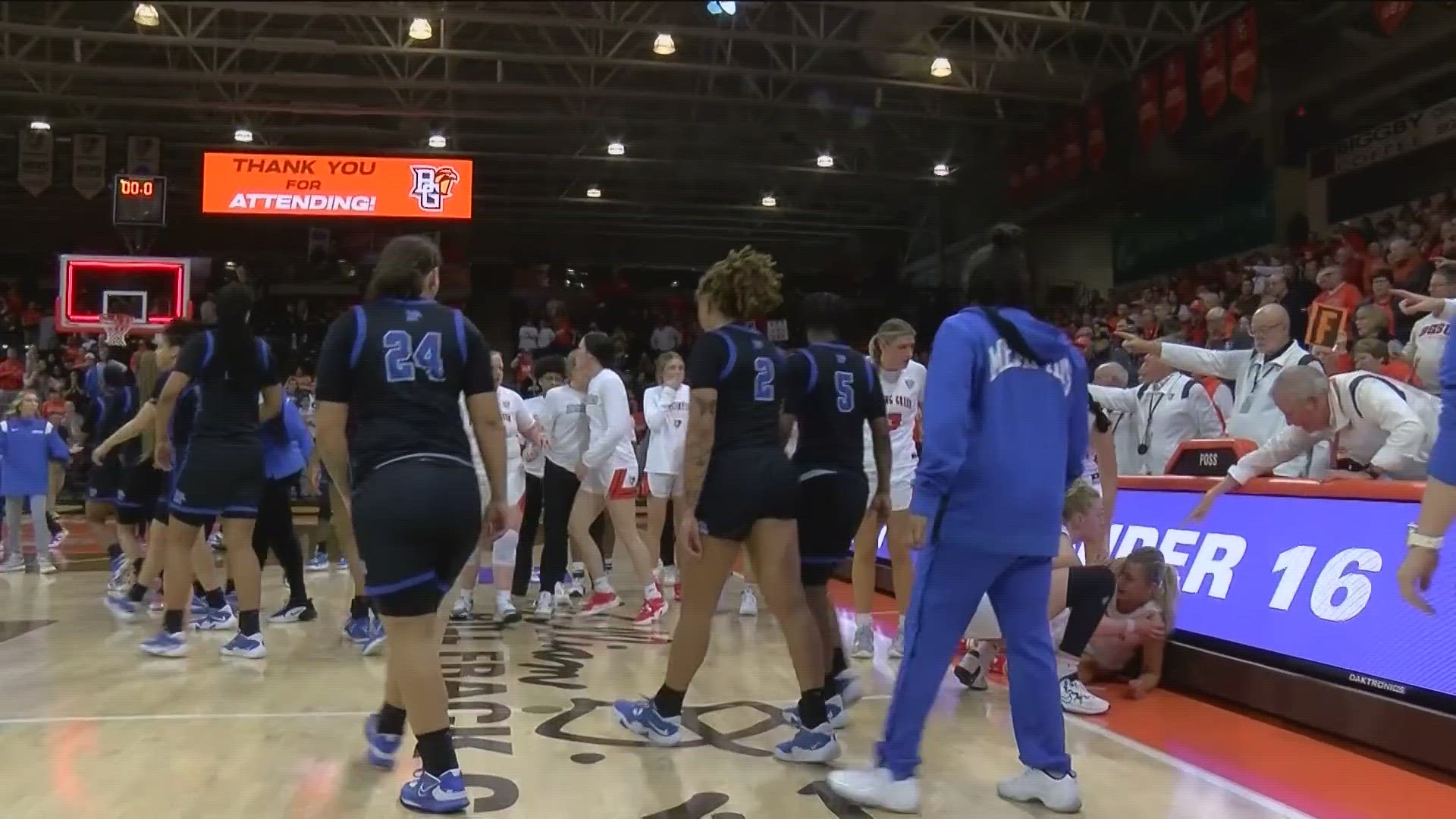 Memphis' Jamirah Shutes and BGSU's Elissa Brett appeared to exchange words in the handshake line after the game before Shutes punched Brett.