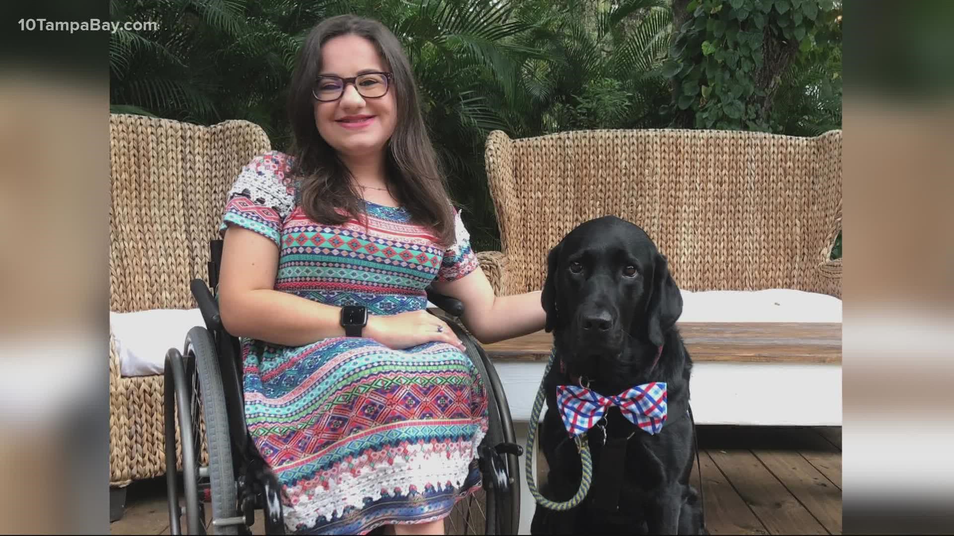 21-year-old Leigh Dittman will graduate from the University of Tampa nursing program on May 7 with honors. Her service dog, Nerf, will walk alongside her.