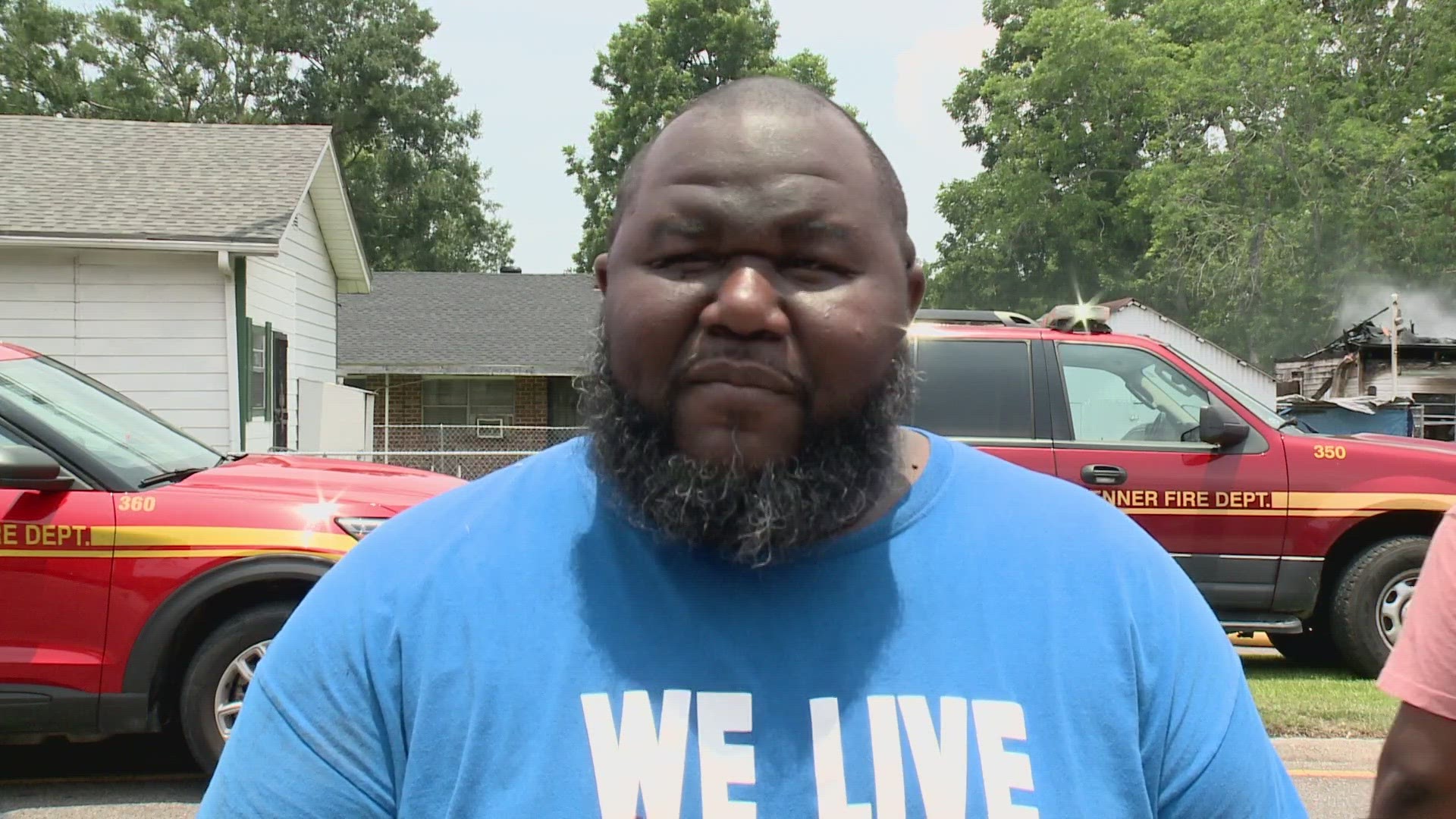 A man says he saw a house on fire so he stopped and rescued those inside.