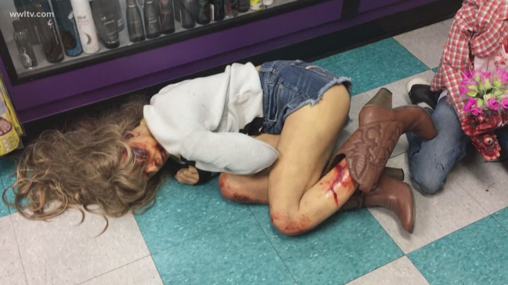 FQ sex shop displays prop that shows bloodied woman