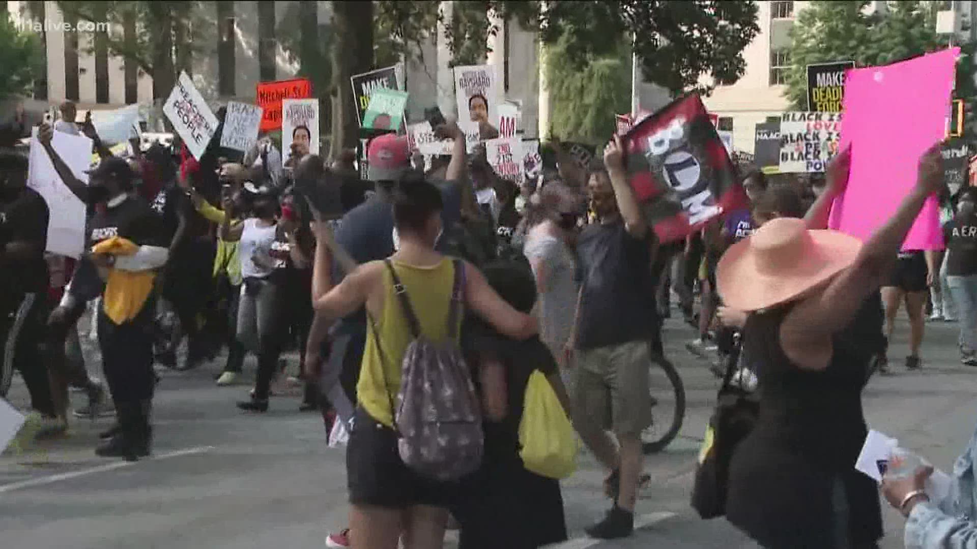 Experts say the fact that protesters were outside and largely wore masks would likely not allow the virus to spread easily.