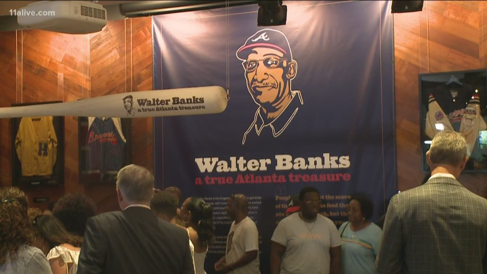 The usher has been with the Braves for 54 years.