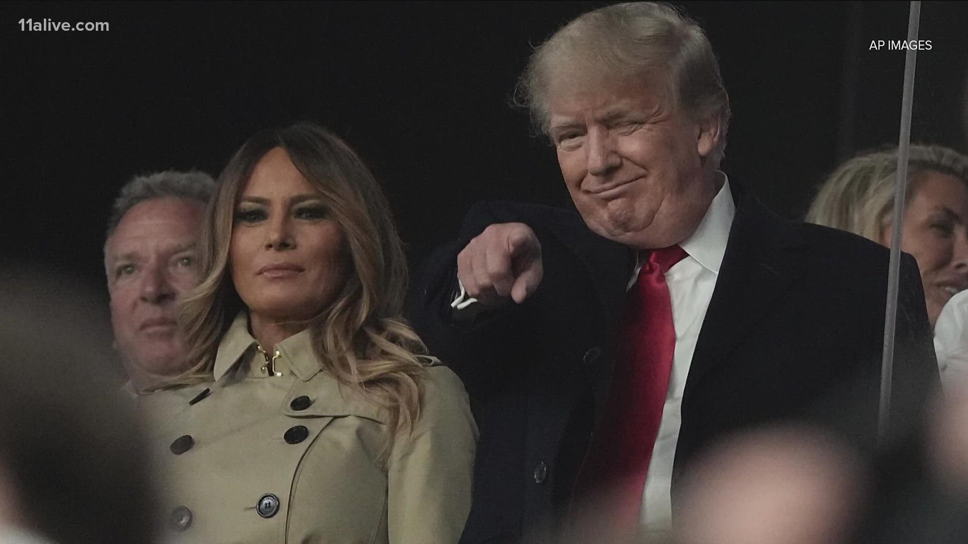 Former President Donald Trump is in attendance Saturday night at Game 4 of the World Series in Atlanta, and he performed the Tomahawk Chop as the game began.